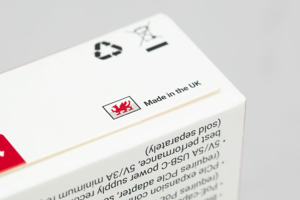 Close up of the Pi 5 box showing a welsh dragon next to the words made in wales
